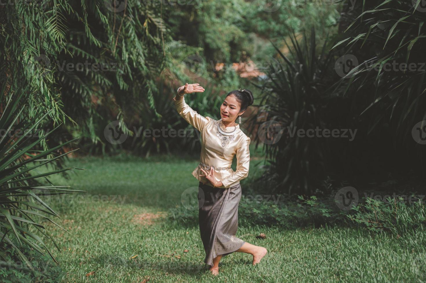 Beautiful Thai girls wear Thai costumes and Thai dance. photo