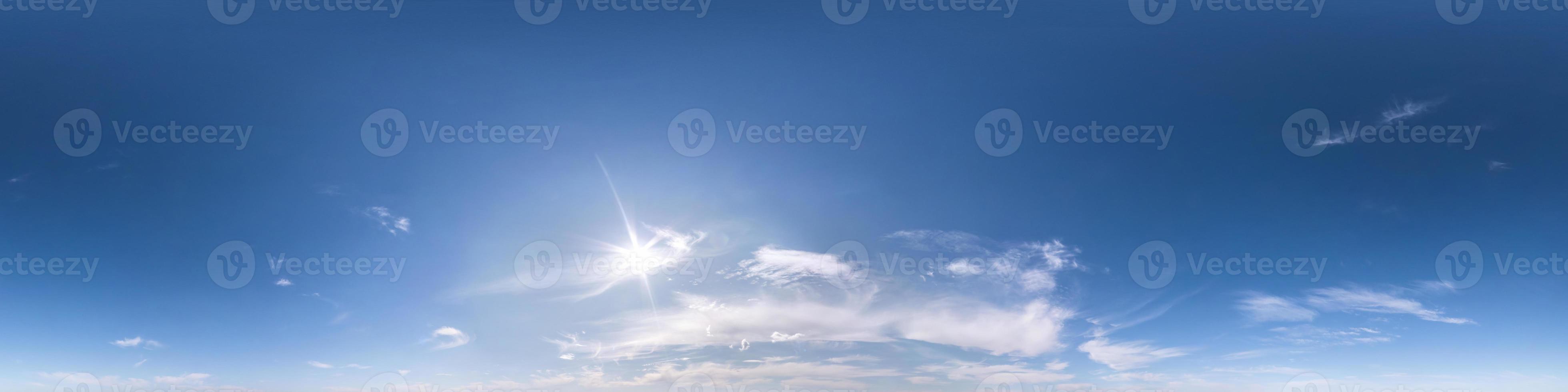 blue sky with beautiful fluffy cumulus clouds without ground. Seamless hdri panorama 360 degrees angle view without ground for use in 3d graphics or game development as sky dome or edit drone shot photo