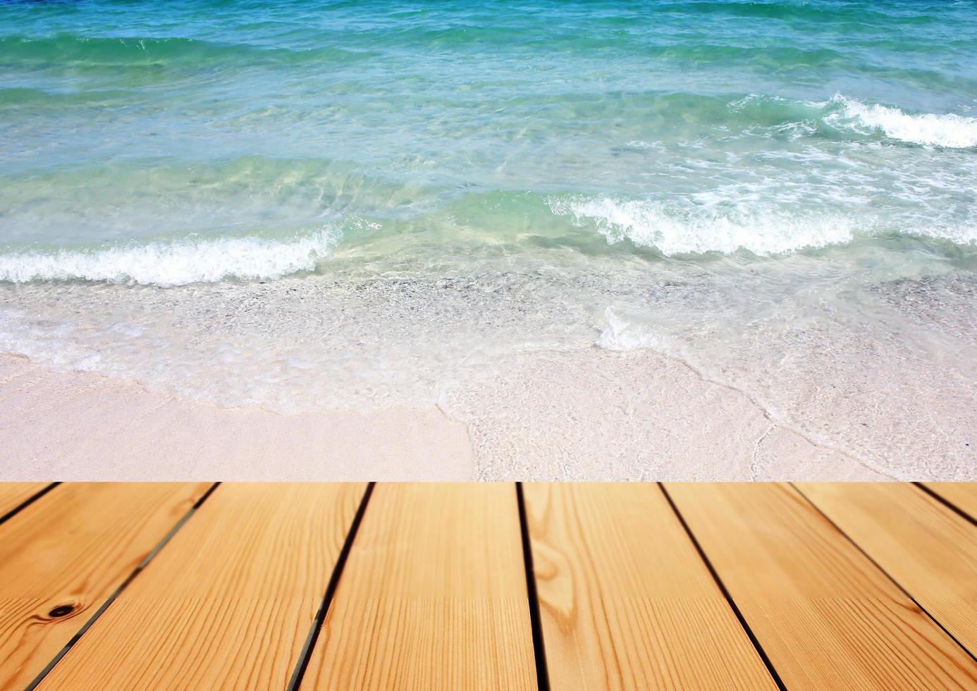 Empty wooden deck table over sea background, Summer concept photo