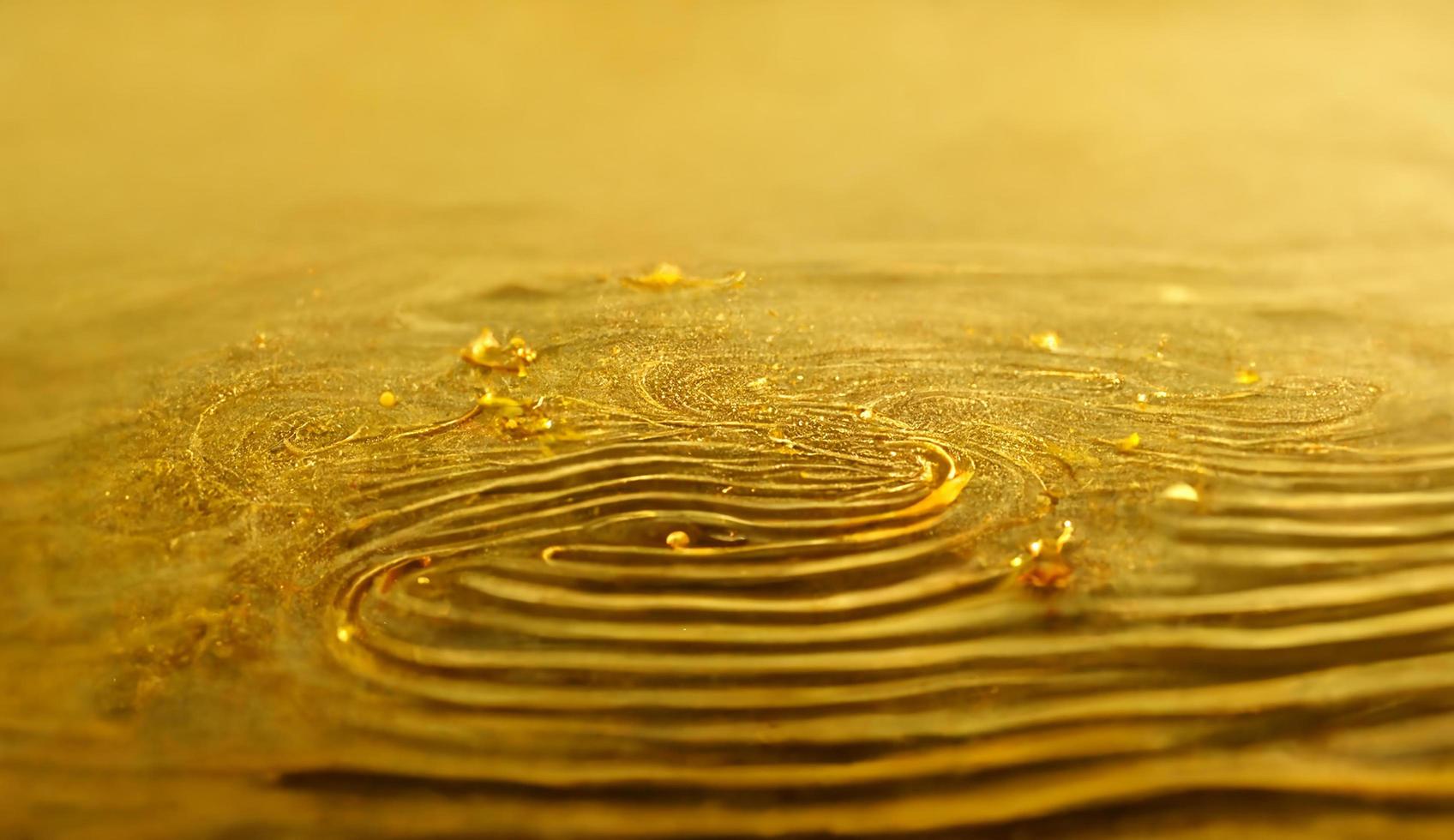 Abstract of gold glitter bright ripple background for christmas holiday decoration photo