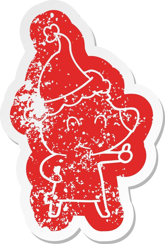 female bear cartoon distressed sticker of a wearing santa hat vector