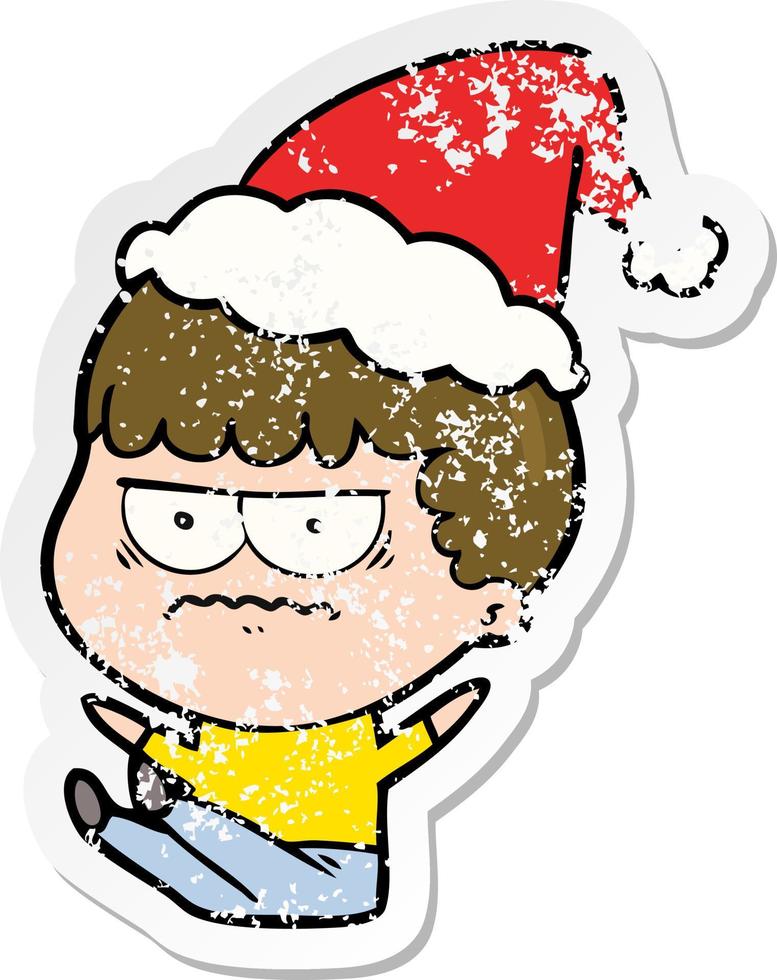 distressed sticker cartoon of a annoyed man wearing santa hat vector