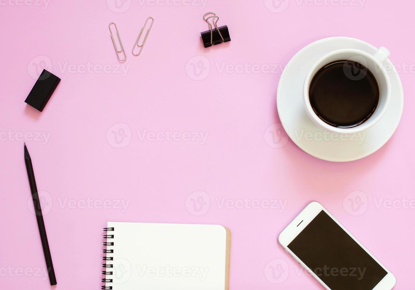 Creative header design mockup set of workspace desk with smartphone, coffee, stationery and notebook with copy space background photo