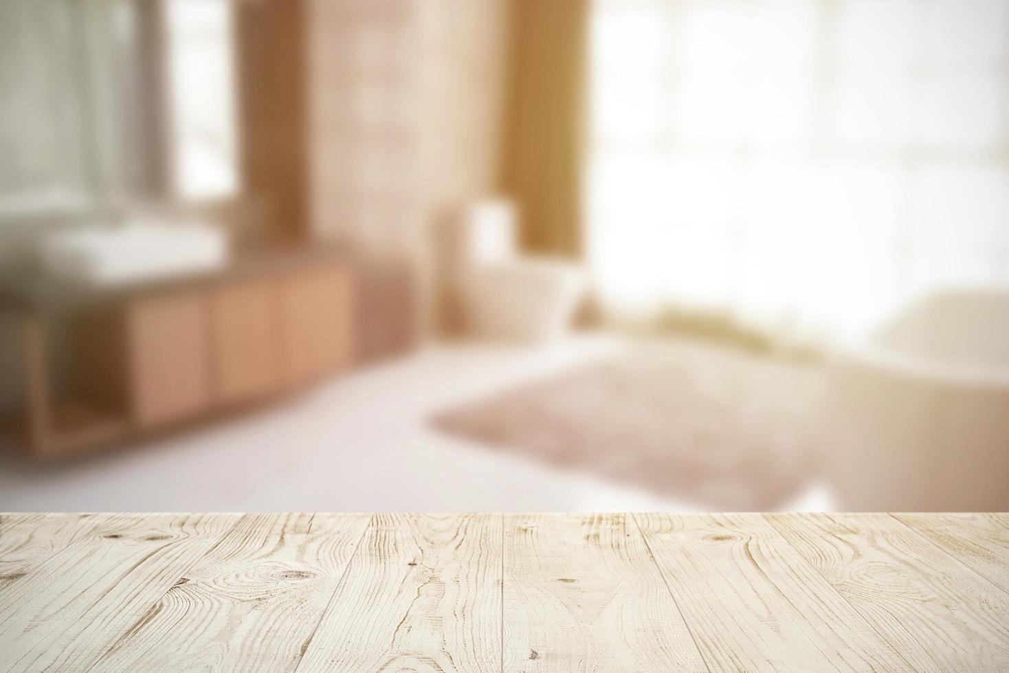 Empty wooden board table top on blur abstract of bathroom interior background, for montage product or display, mock up for display of product photo