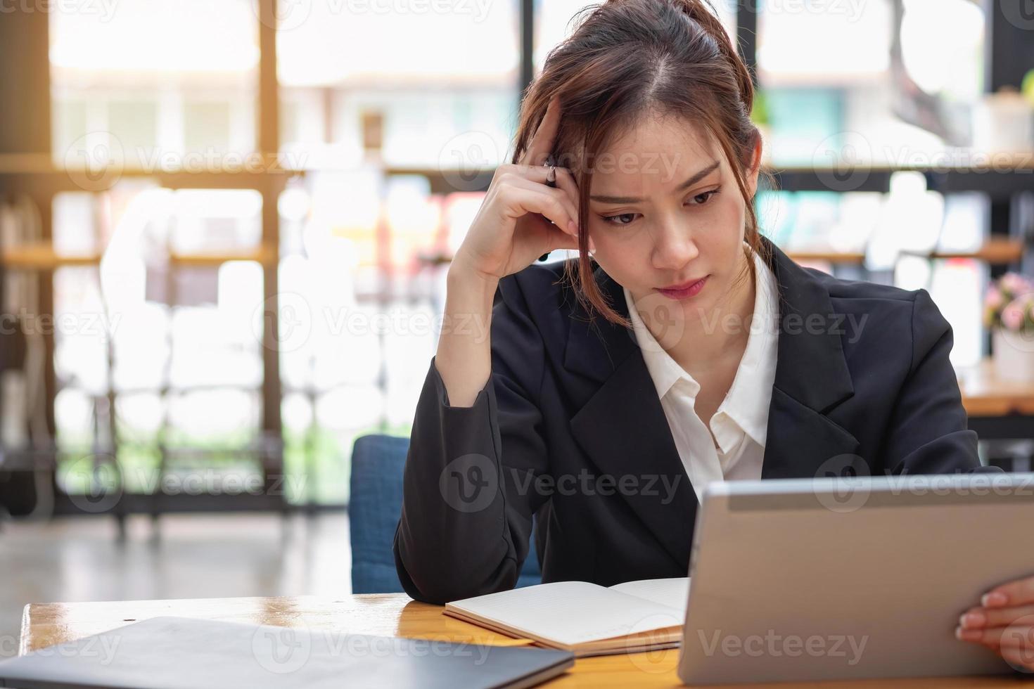 Burnout syndrome at work concept. exhausted overworked woman working in office.Concept Burnout Syndrome. photo