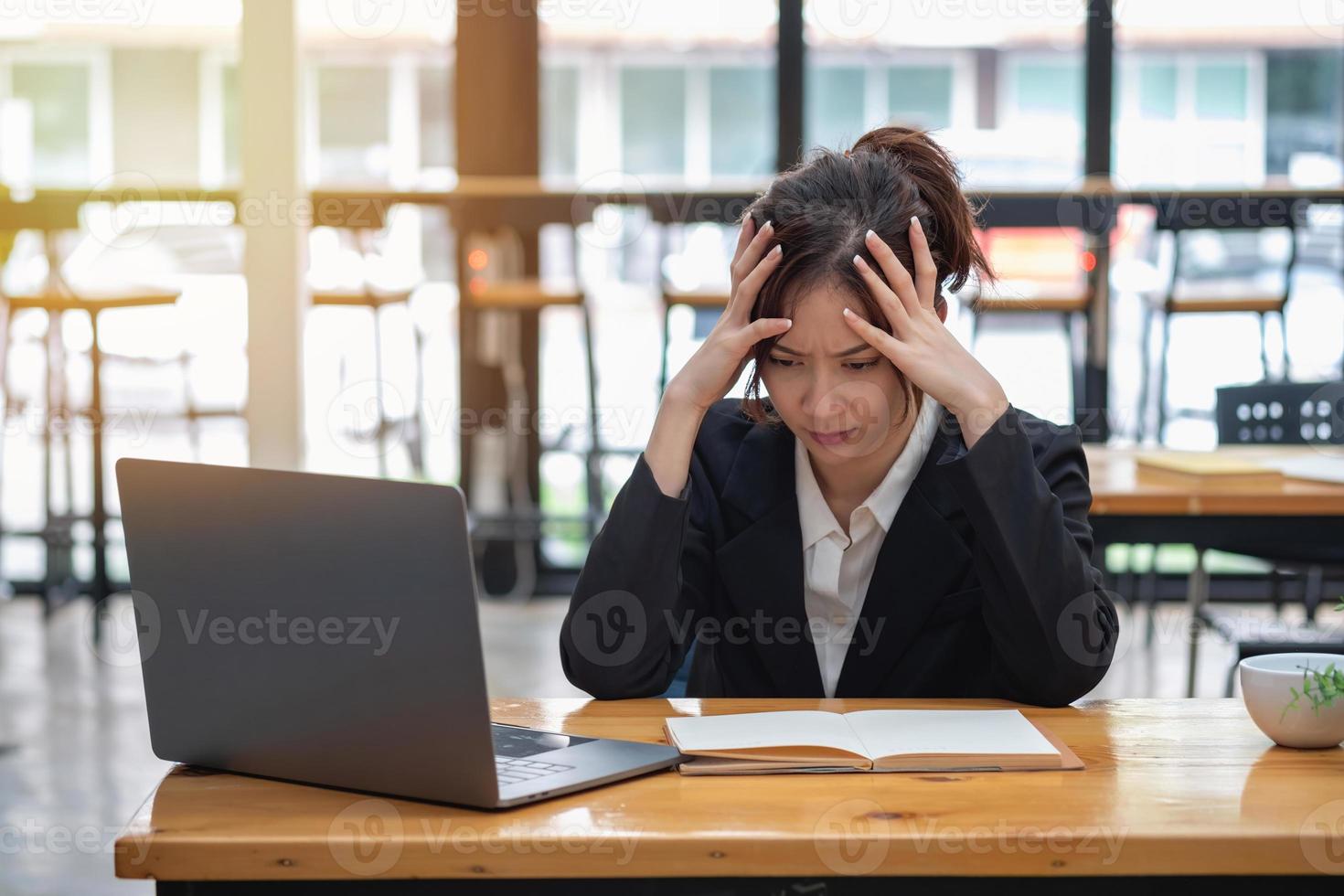 Burnout syndrome at work concept. exhausted overworked woman working in office.Concept Burnout Syndrome. photo