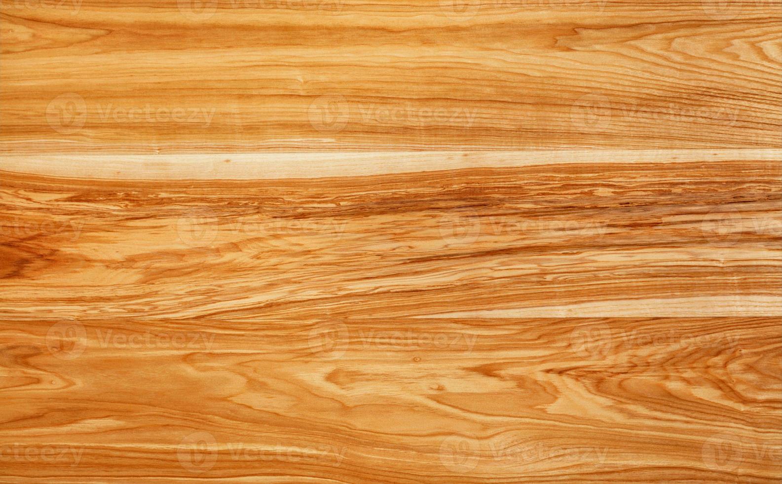 Beautiful texture of natural European walnut wood planks with a horizontal grain pattern. photo