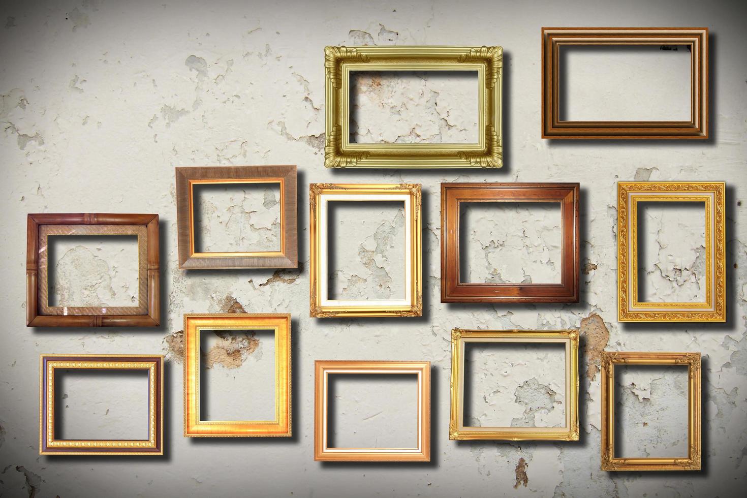 golden frame on old wall photo