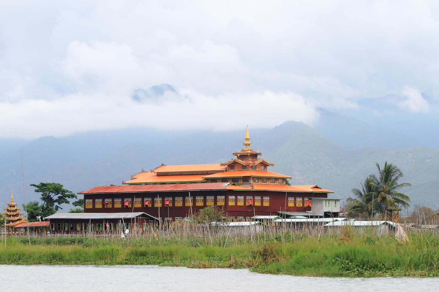 Wooden burmese buddhist monastery on the Inle lake, Myanmar photo