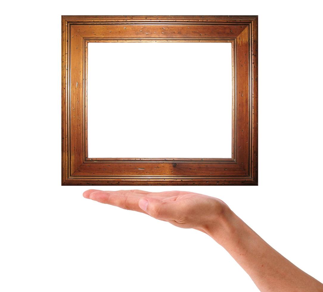 Wooden framework in a hand on a white background photo