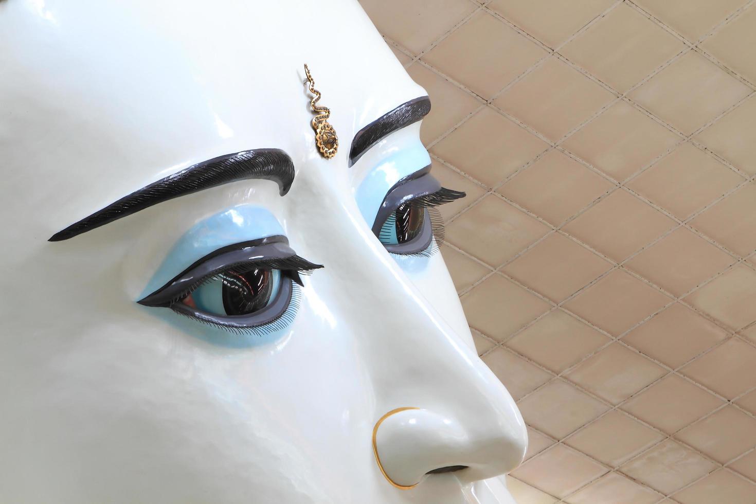 The giant reclining Buddha at Chaukhtatgyi temple in Yangon, Myanma photo