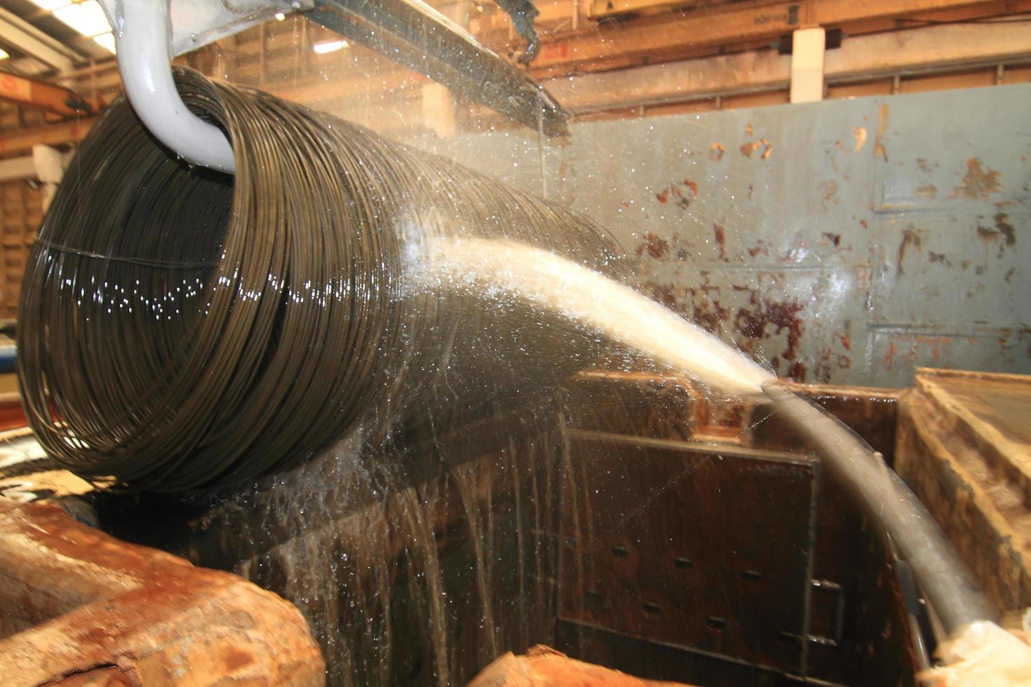 Large spools of Steel Coils being moved. photo