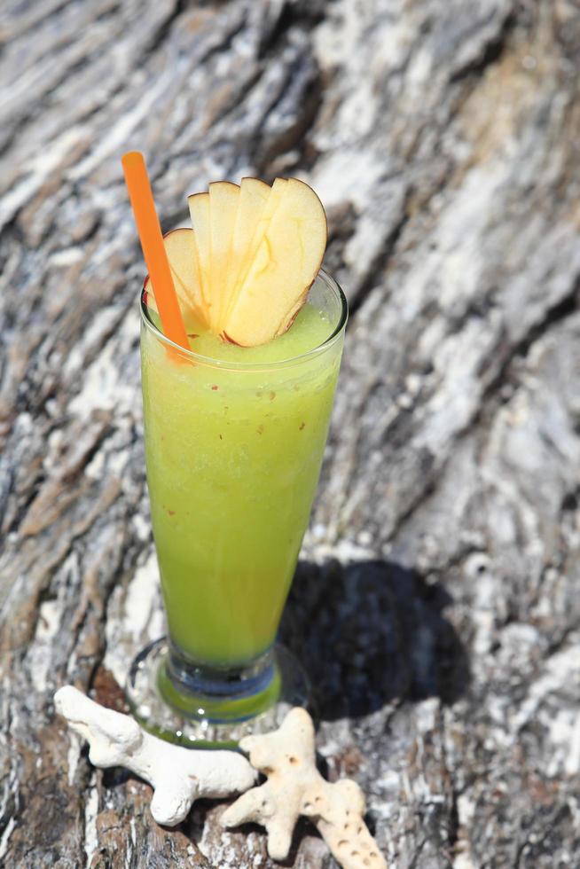 fruit cocktail on a tropical island beach photo