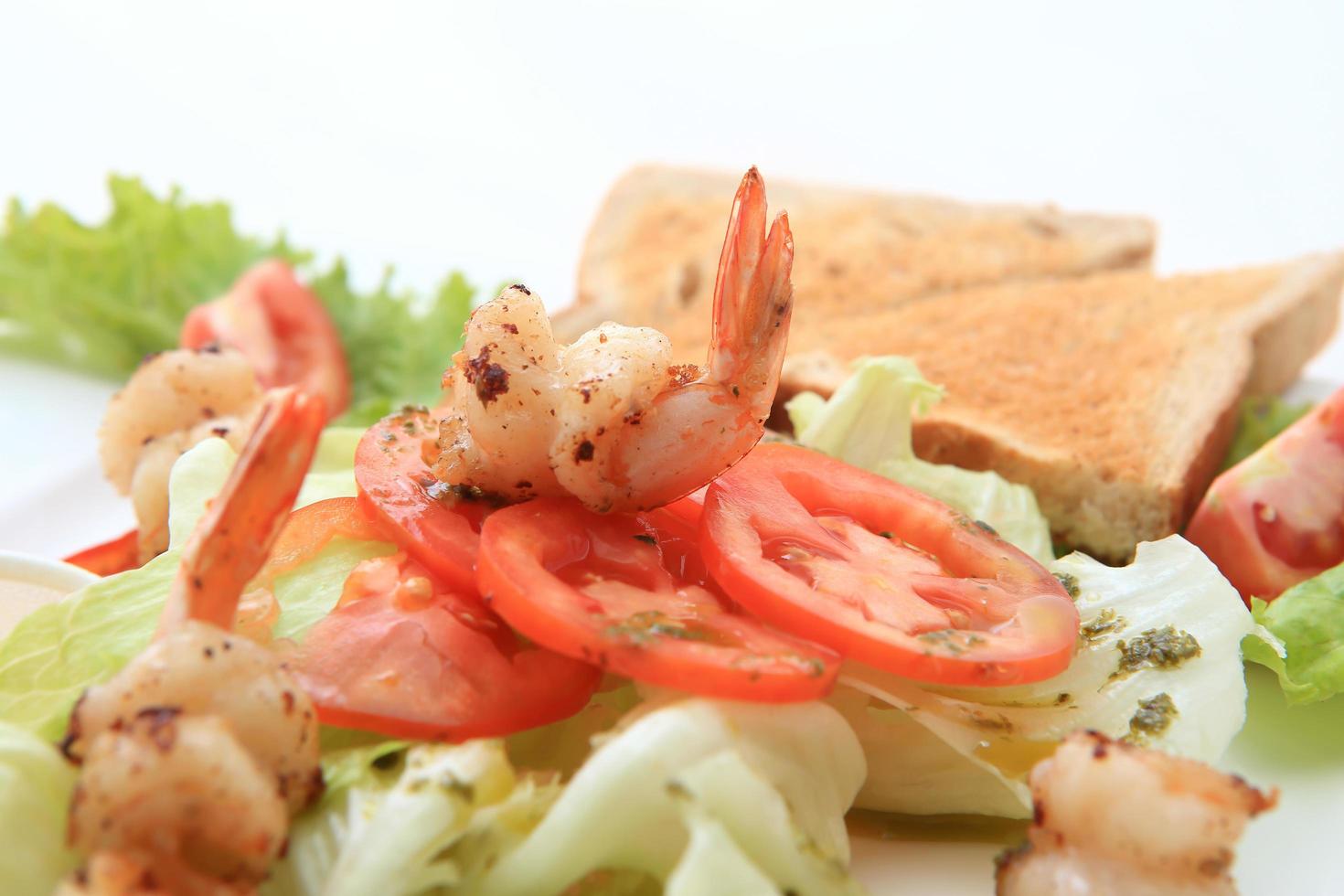 Green salad with shrimps photo