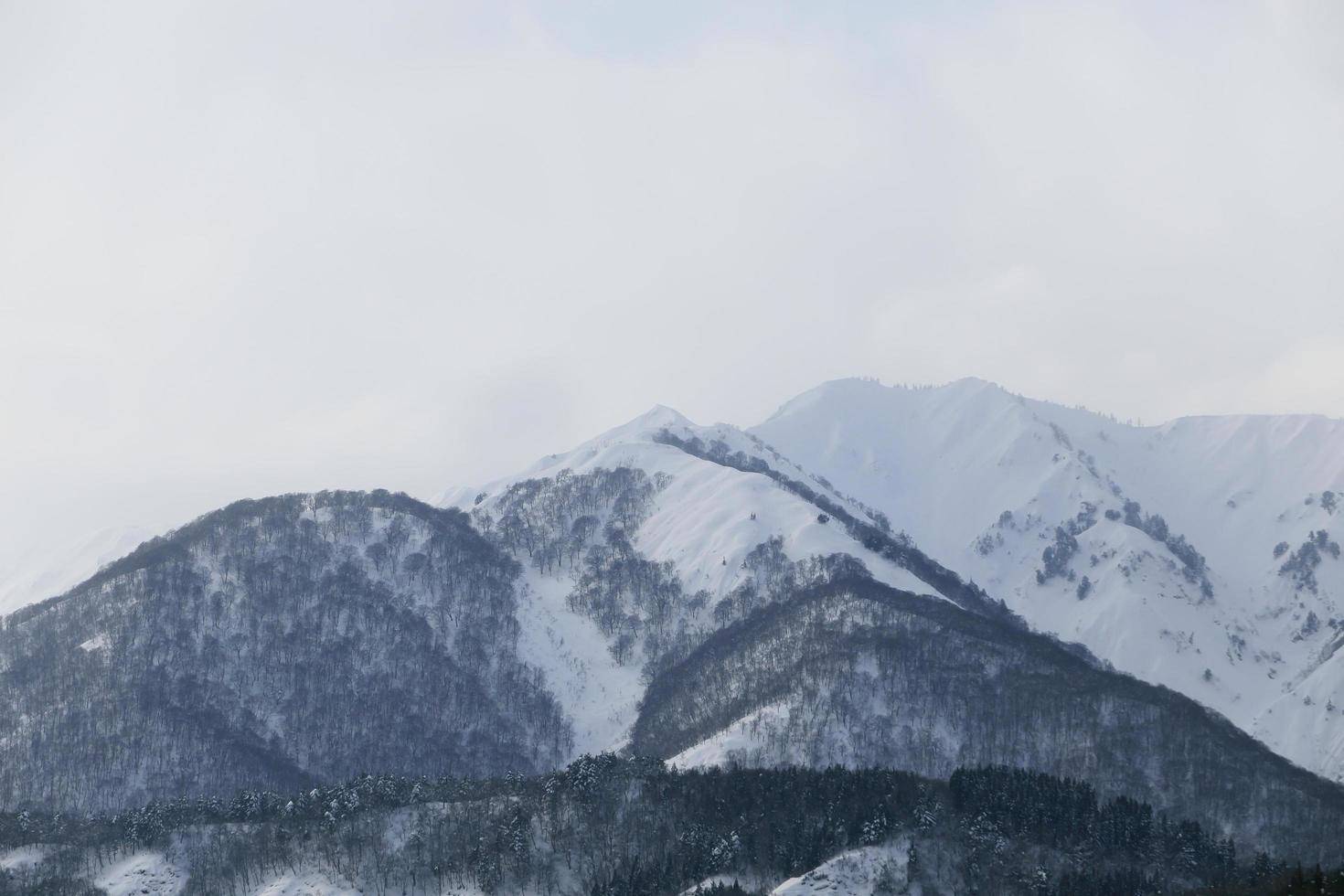 snow covered mountain in Takayama japan photo