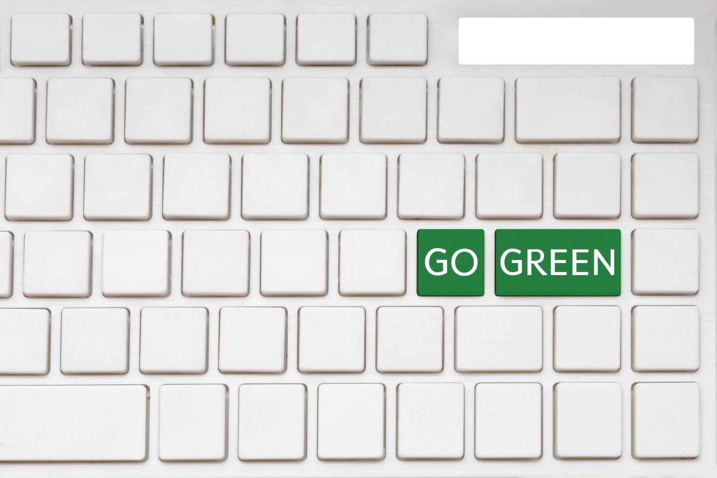 Go green button on computer photo