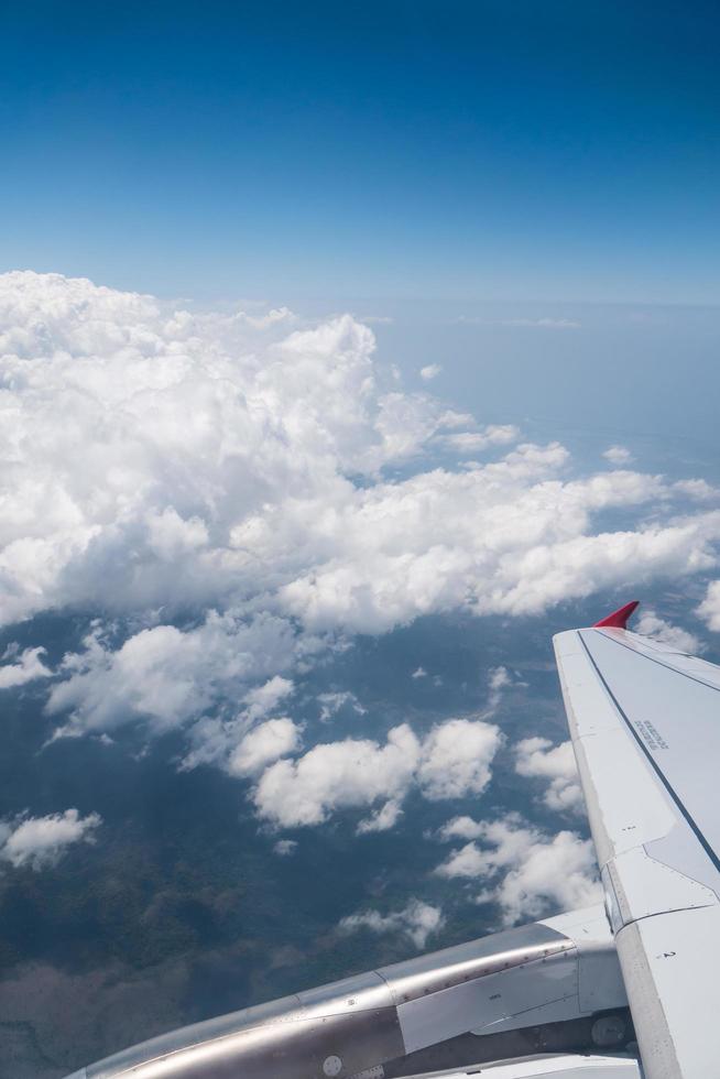 blue sky and clouds on plane photo