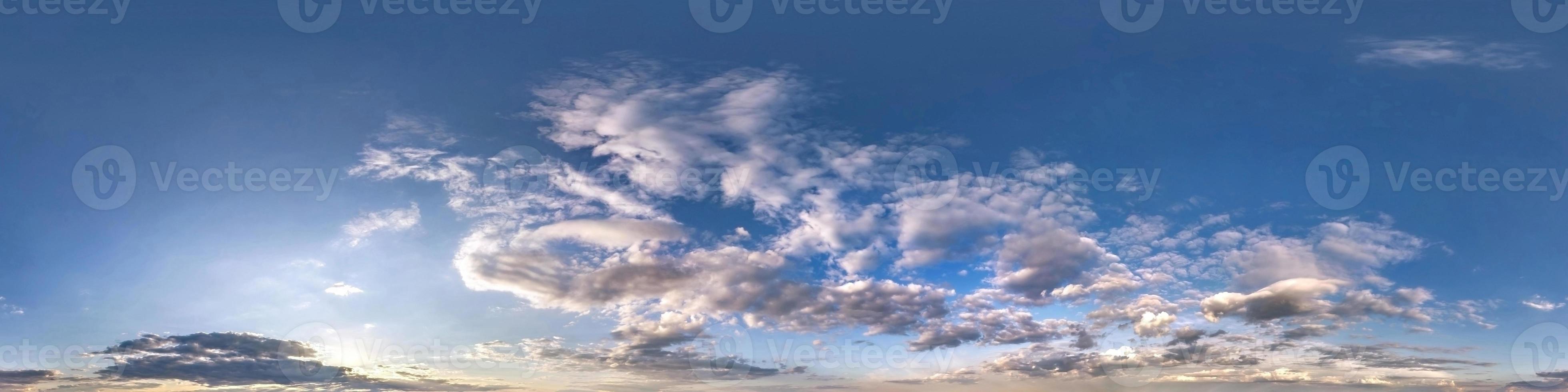 blue sky with beautiful fluffy clouds without ground. Seamless hdri panorama 360 degrees angle view for use in 3d graphics or game development as sky dome or edit drone shot photo