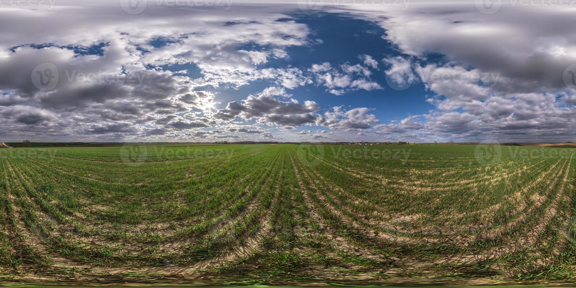 full seamless spherical hdri panorama 360 degrees angle view on among fields in spring day with awesome clouds in equirectangular projection, ready for VR AR virtual reality content photo