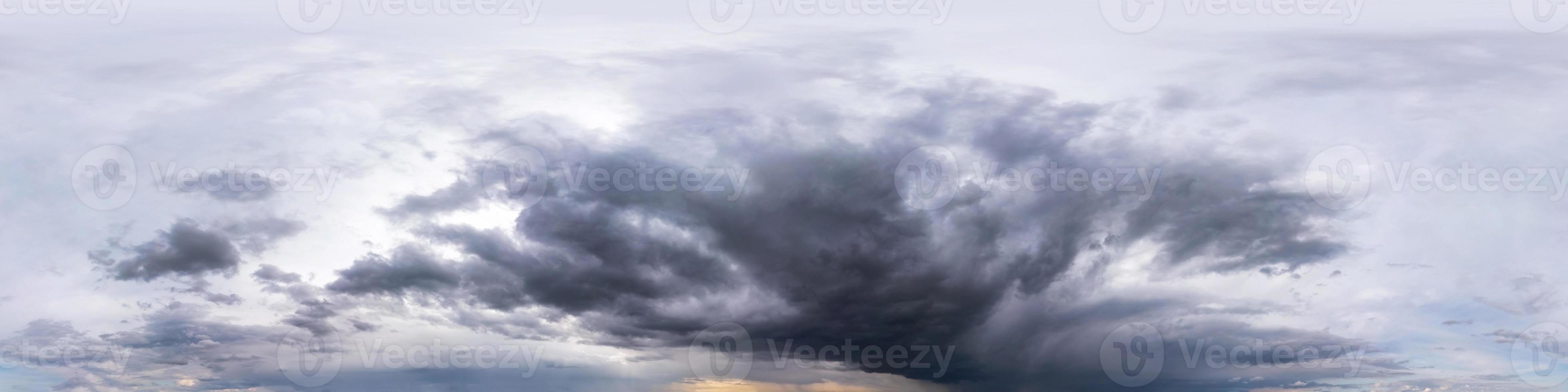 blue sky with beautiful dark clouds before storm. Seamless hdri panorama 360 degrees angle view with zenith for use in 3d graphics or game development as sky dome or edit drone shot photo