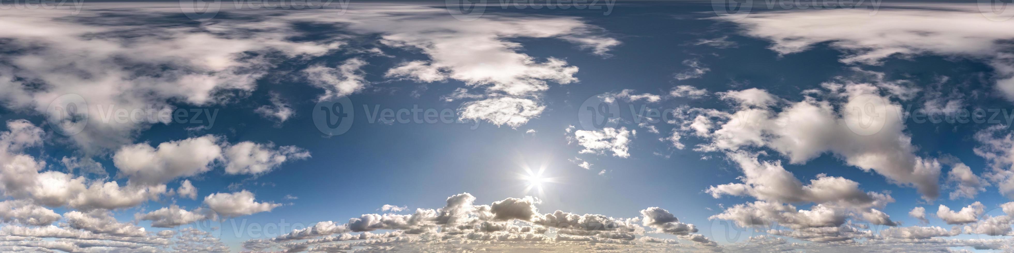 Seamless hdri panorama 360 degrees angle view blue sky with beautiful cumulus clouds with zenith for use in 3d graphics or game development as sky dome or edit drone shot photo