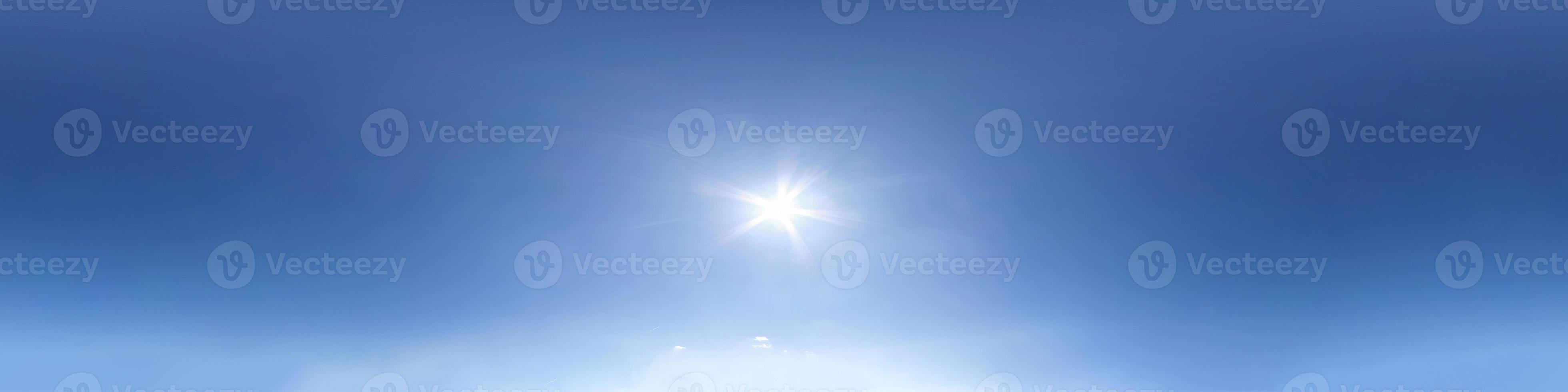 Seamless spherical hdri panorama 360 degrees angle view blue clear sky with scorching sun with zenith for use in 3d graphics or game development as sky dome or edit drone shot photo