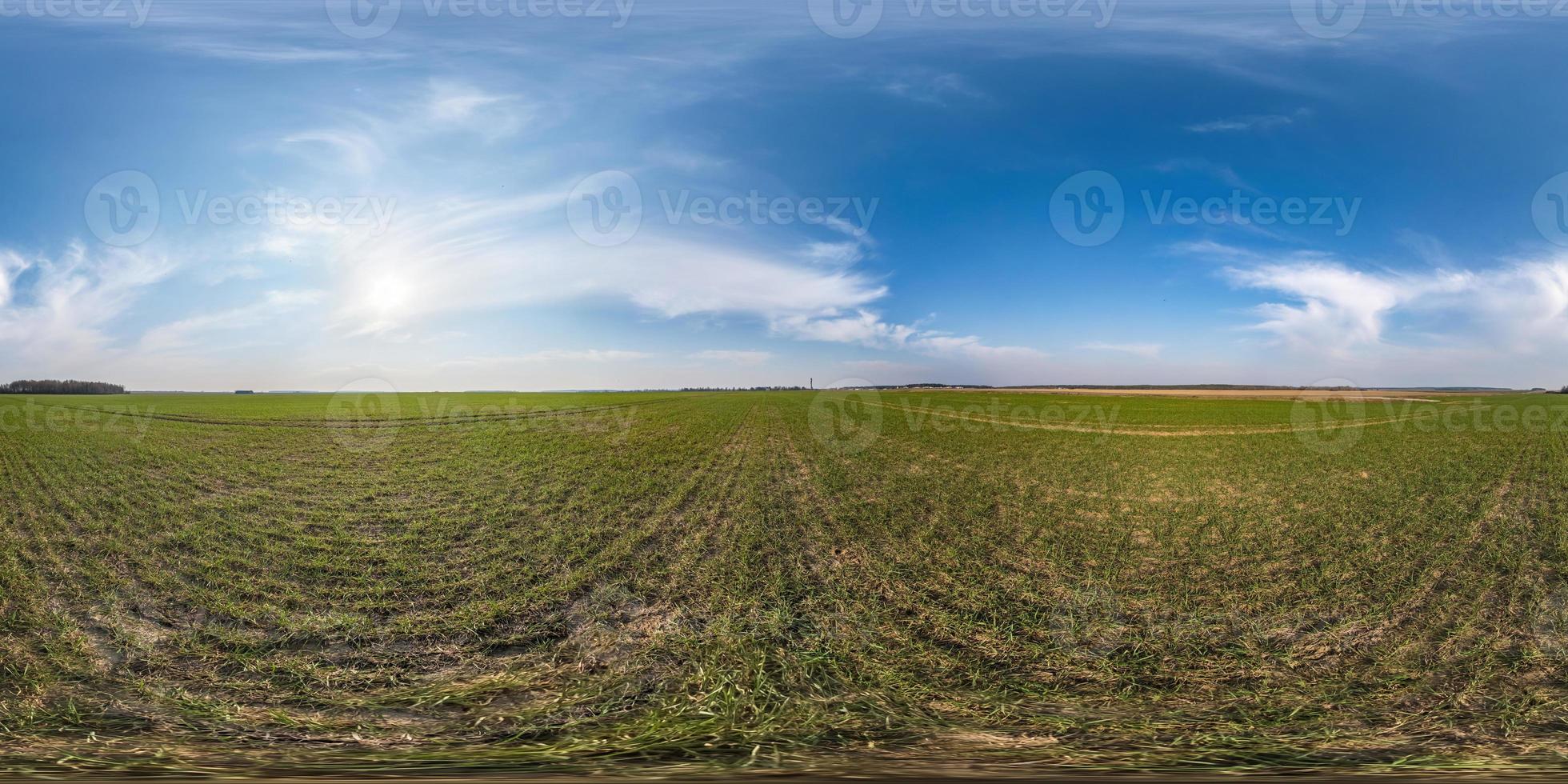 full seamless spherical hdri panorama 360 degrees angle view on among fields in spring day with awesome clouds in equirectangular projection, ready for VR AR virtual reality content photo
