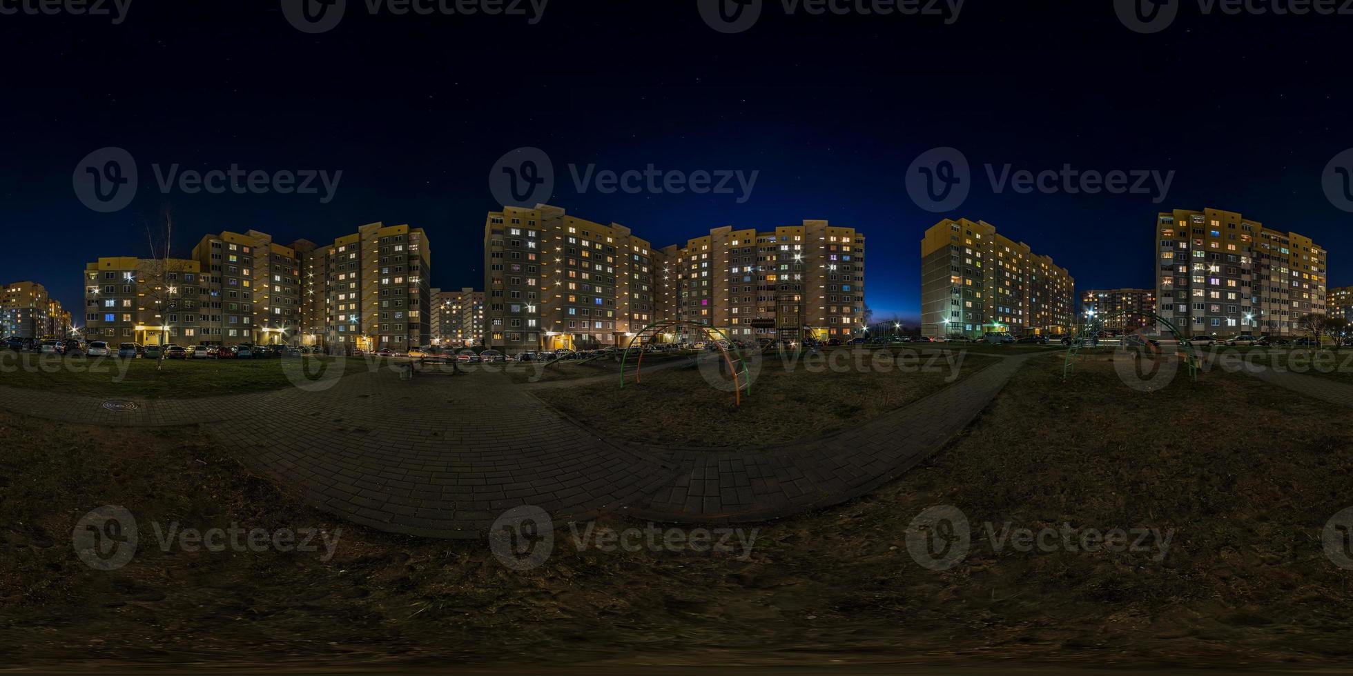 full seamless spherical hdri night panorama 360 on empty street of multistory buildings residential quarter with light in windows in equirectangular projection. social distancing concept. quarantine photo