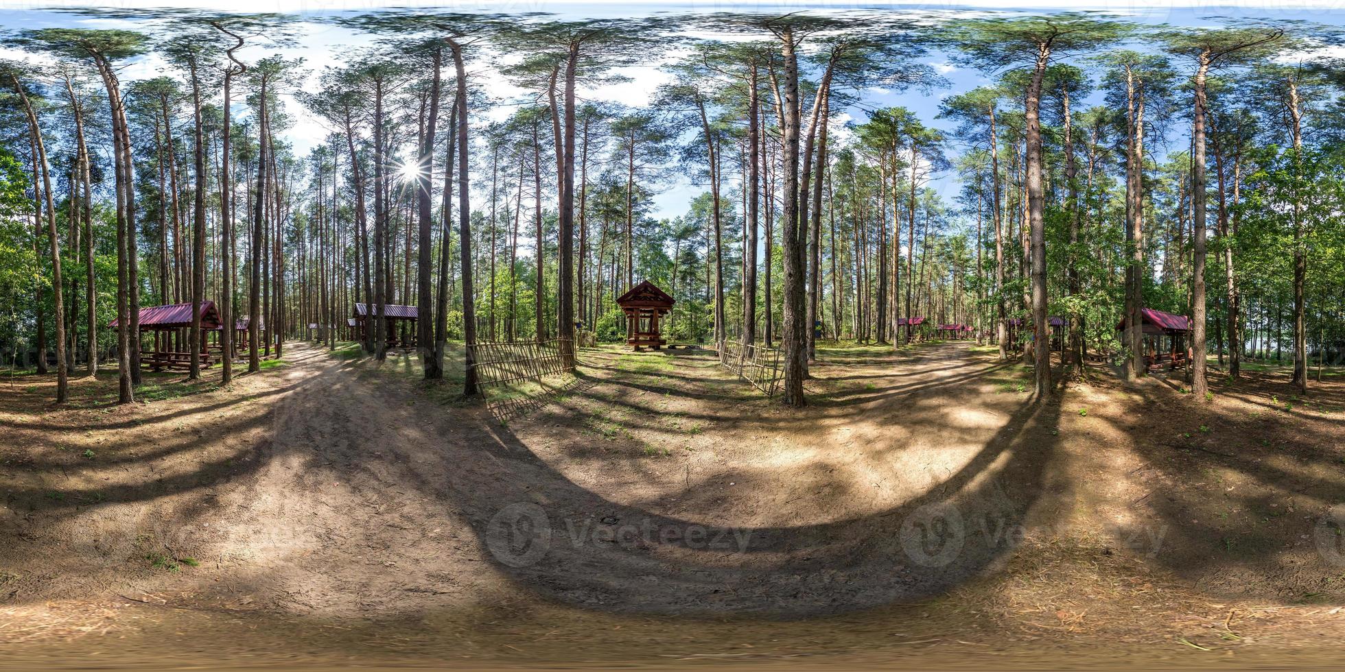 full seamless spherical hdri panorama 360 degrees angle view in wooden camping arbors  with all conviniences in a pine forest in equirectangular projection with zenith and nadir, for VR AR content photo