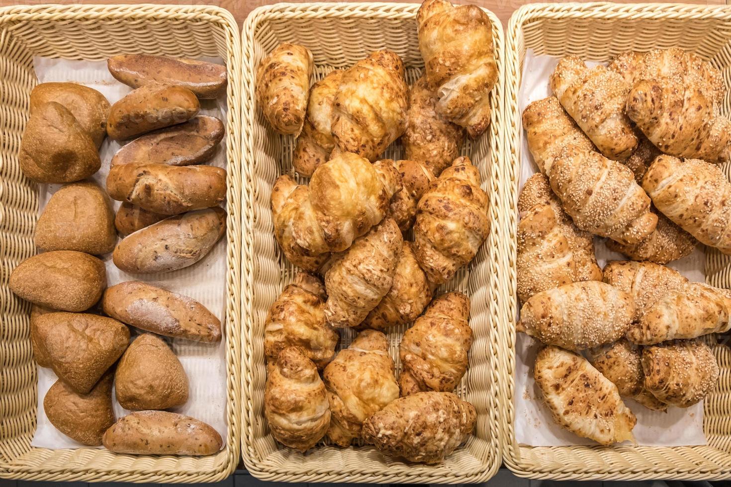 fresh buns with raisins poppy seeds and cinnamon in the mall 10386452 Stock Photo at Vecteezy