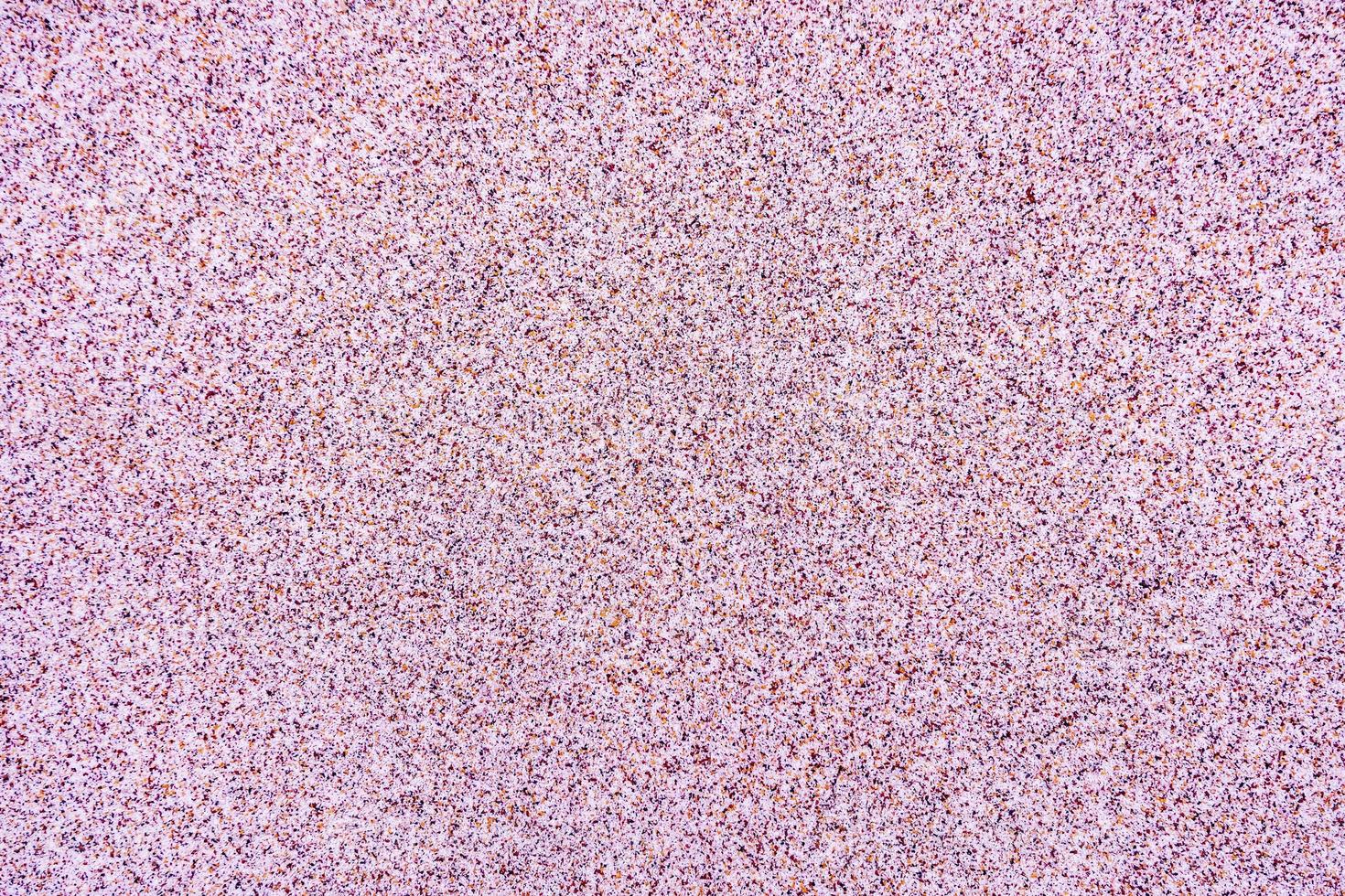 Close up surface of texture of small stone or sand wall background photo