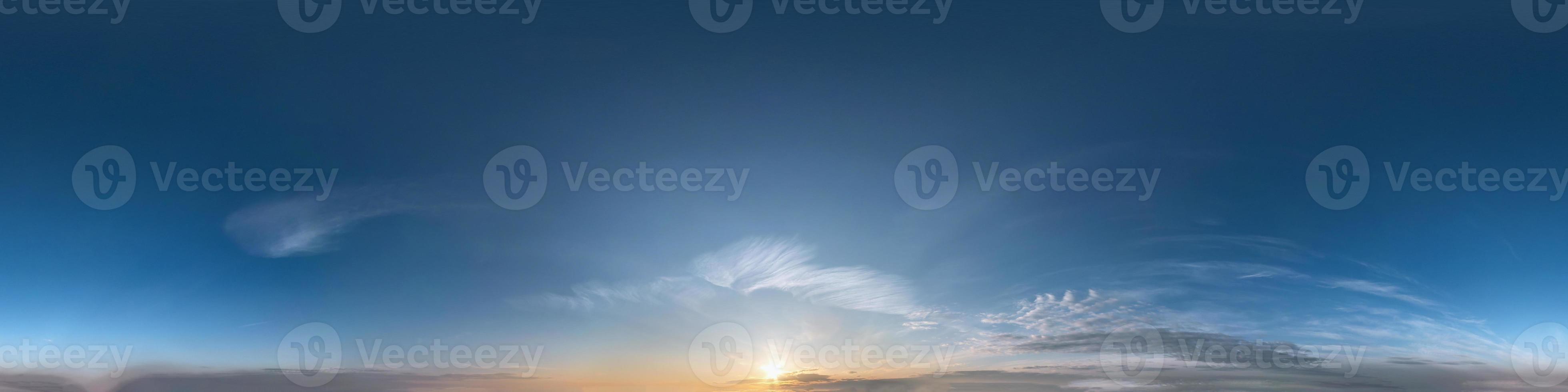 dark blue sky before sunset with beautiful awesome clouds. Seamless hdri panorama 360 degrees angle view with zenith for use in 3d graphics or game development as sky dome or edit drone shot photo