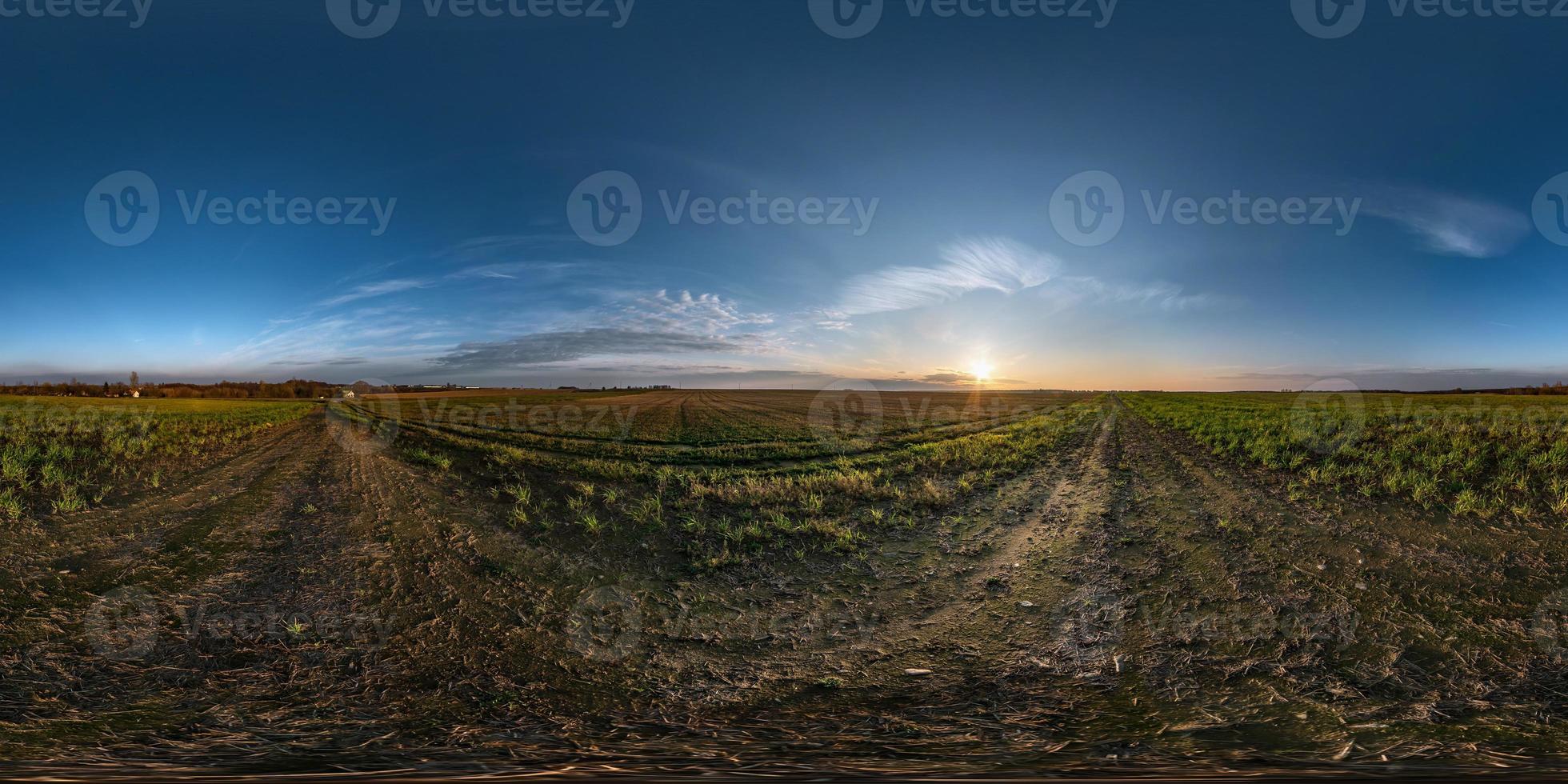 blue sky before sunset with beautiful awesome clouds. full seamless spherical hdri panorama 360 degrees angle view among fields in evening in equirectangular projection, ready for VR AR content photo