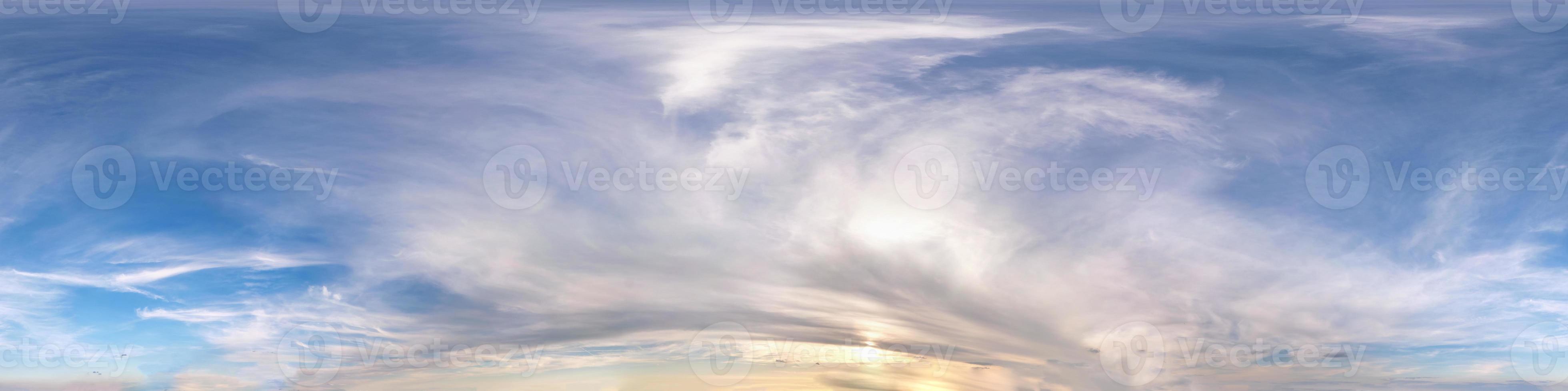 Seamless evening sky before sunset hdri panorama 360 degrees angle view with beautiful clouds  with zenith for use in 3d graphics as sky dome or edit drone shot photo