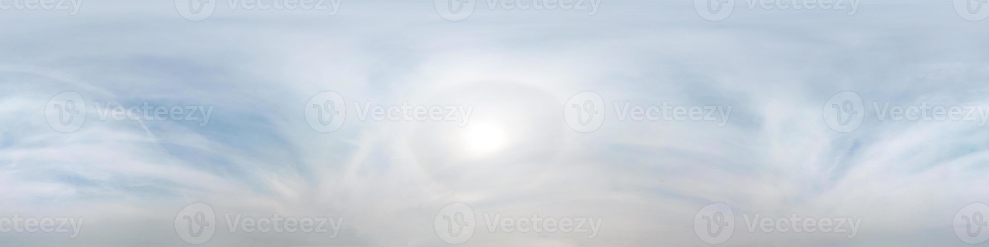 clear blue sky with halo sun. Seamless hdri panorama 360 degrees angle view with zenith for use in 3d graphics or game development as sky dome or edit drone shot photo