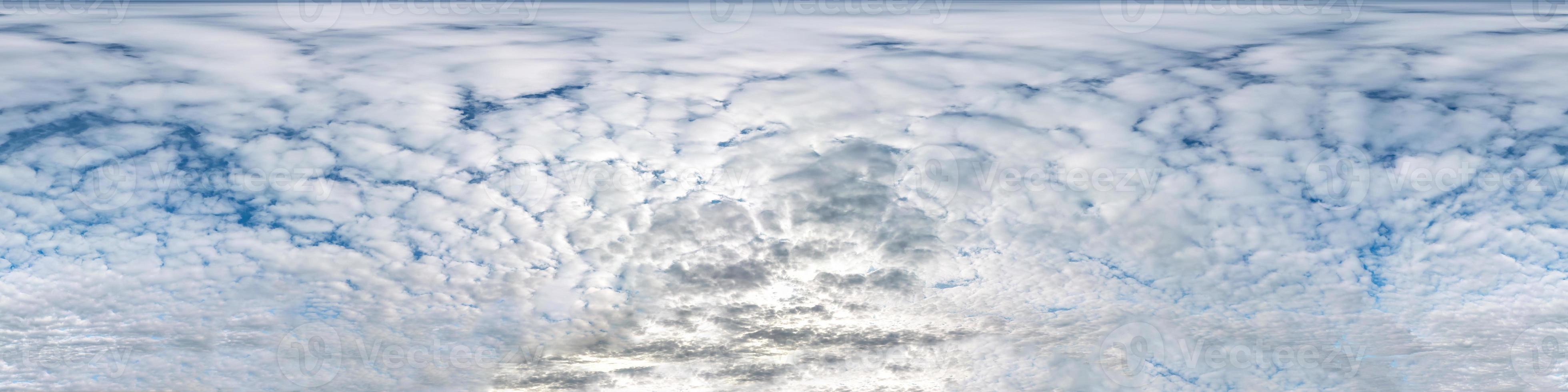 Seamless cloudy blue sky hdri panorama 360 degrees angle view with zenith and beautiful clouds for use in 3d graphics as sky dome or edit drone shot photo