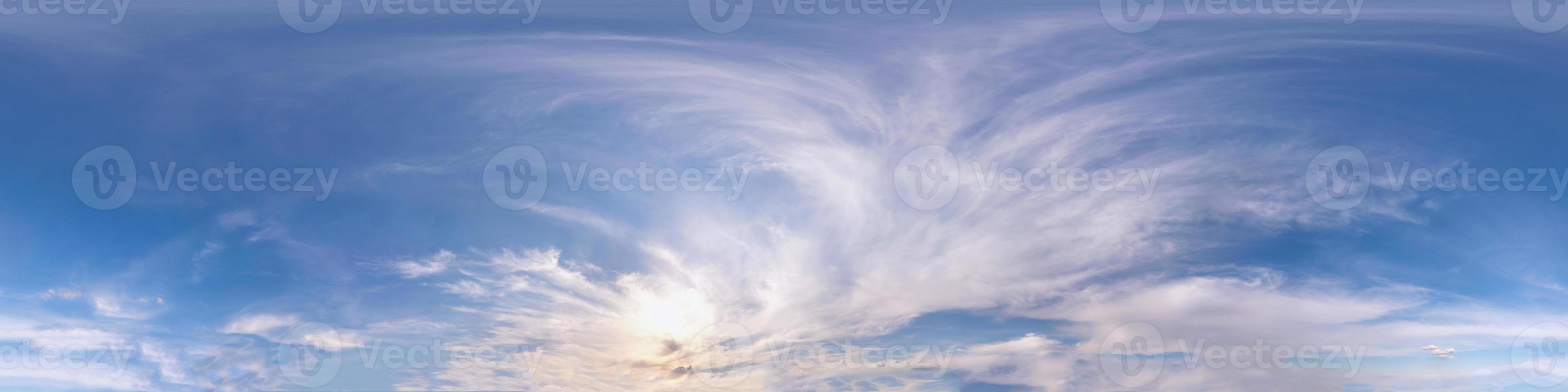 Seamless cloudy blue evening sky hdri panorama 360 degrees angle view before sunset with zenith and beautiful clouds in equirectangular projection for use in 3d graphics as sky dome or edit drone shot photo