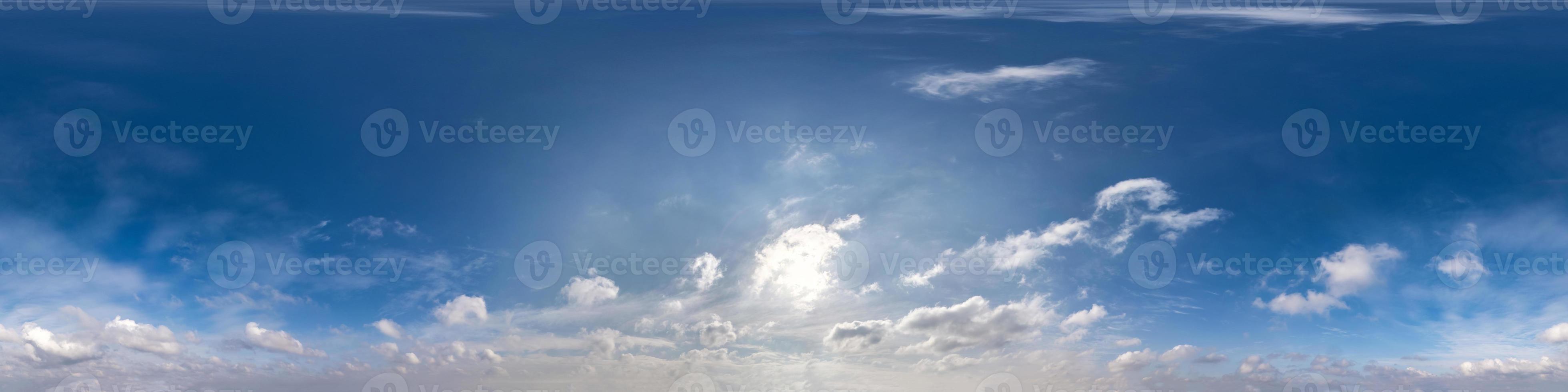 Seamless hdri panorama 360 degrees angle view blue sky with beautiful cumulus clouds with zenith for use in 3d graphics or game development as sky dome or edit drone shot photo