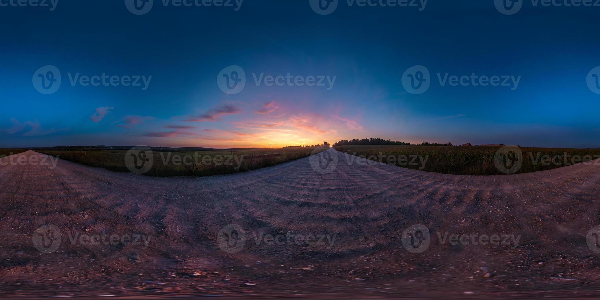 full seamless spherical hdri panorama 360 degrees angle view on asphalt road among fields in summer evening sunset with awesome clouds in equirectangular projection, ready for VR AR virtual reality photo