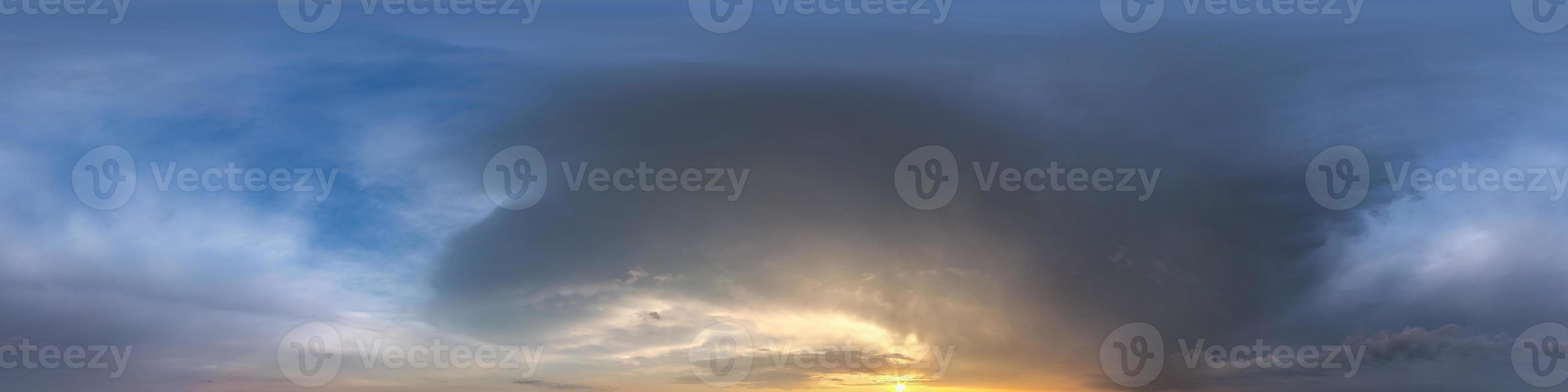 dark blue sky before sunset with beautiful awesome clouds before storm. Seamless hdri panorama 360 degrees angle view with zenith for use in graphics or game development as sky dome or edit drone shot photo