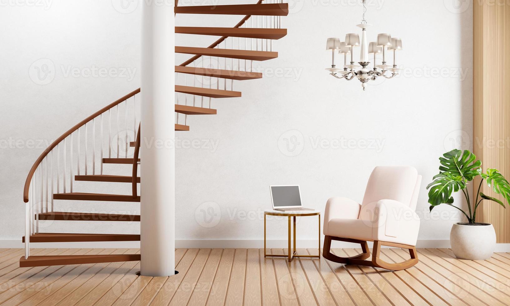 Modern living room with staircase plants chandelier lamp and laptop computer on wooden floor with white wall background. photo