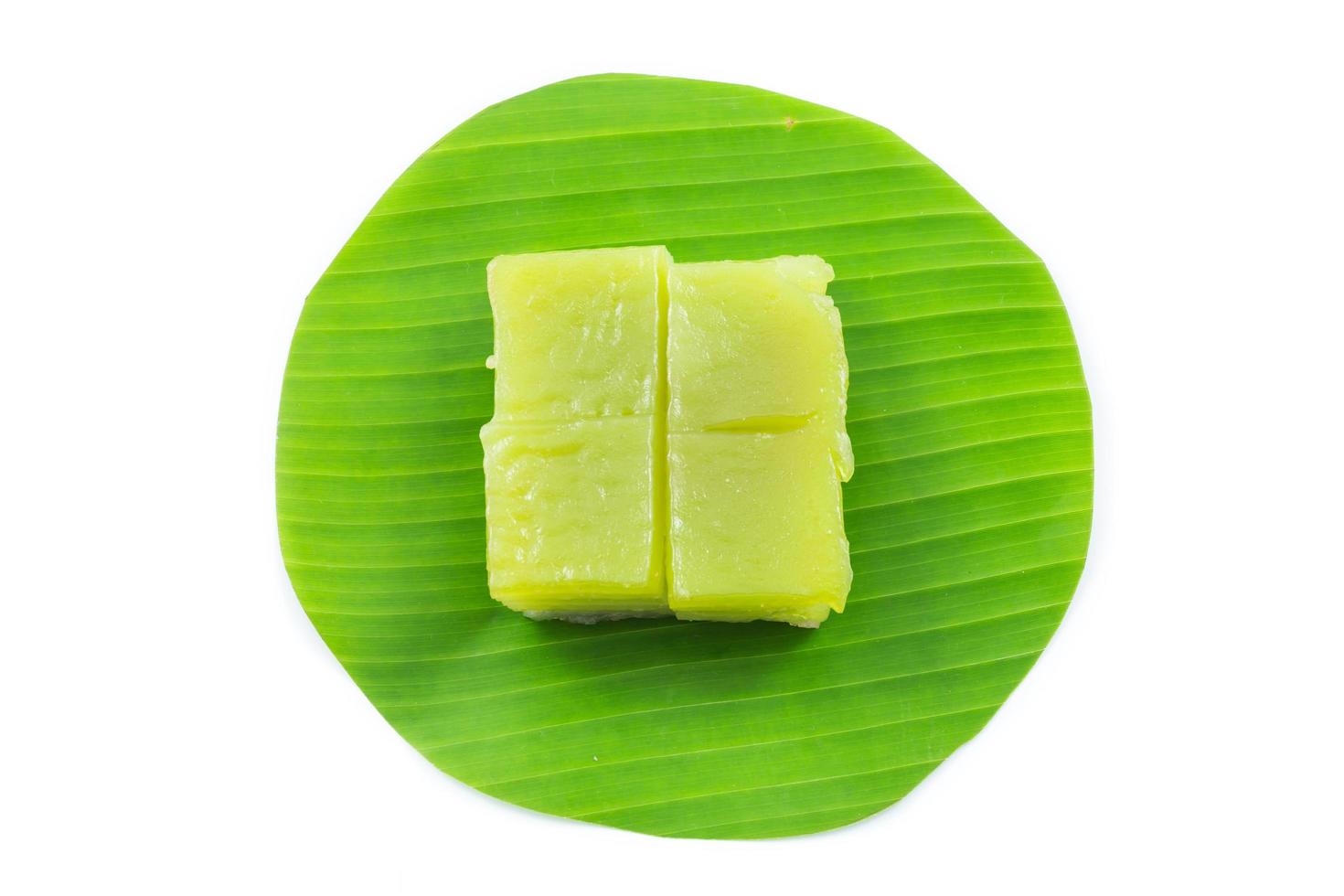 Kind of Thai sweetmeat, Multi Layer Sweet Cake Kanom Chan on banana leaf in white background photo