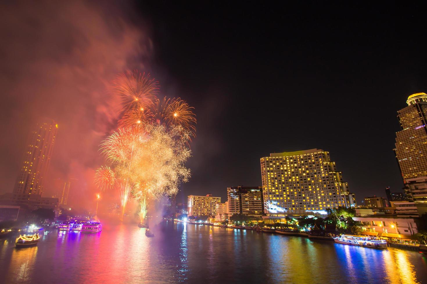 Firework with smoke at Chao Phraya River in countdown celebration party 2016 Bangkok Thailand photo