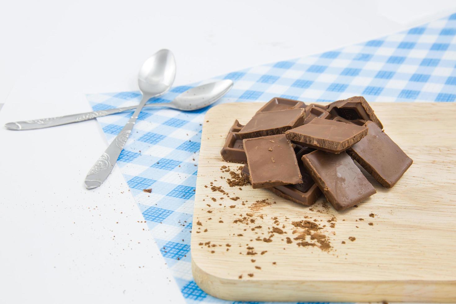 Group of chocolate candy isolated on wood. concept photo