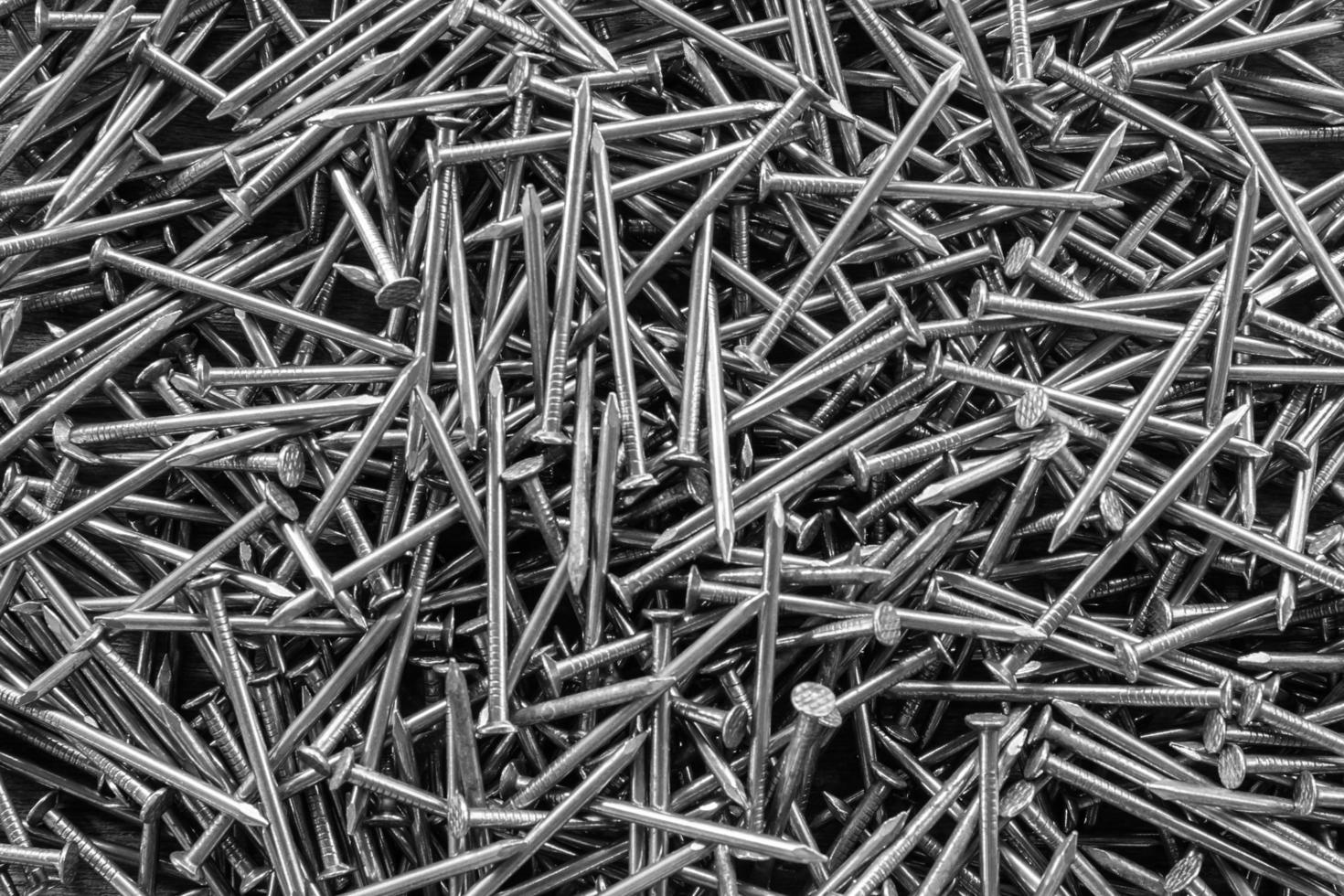 Group of nails and screw background. Black and white color photo