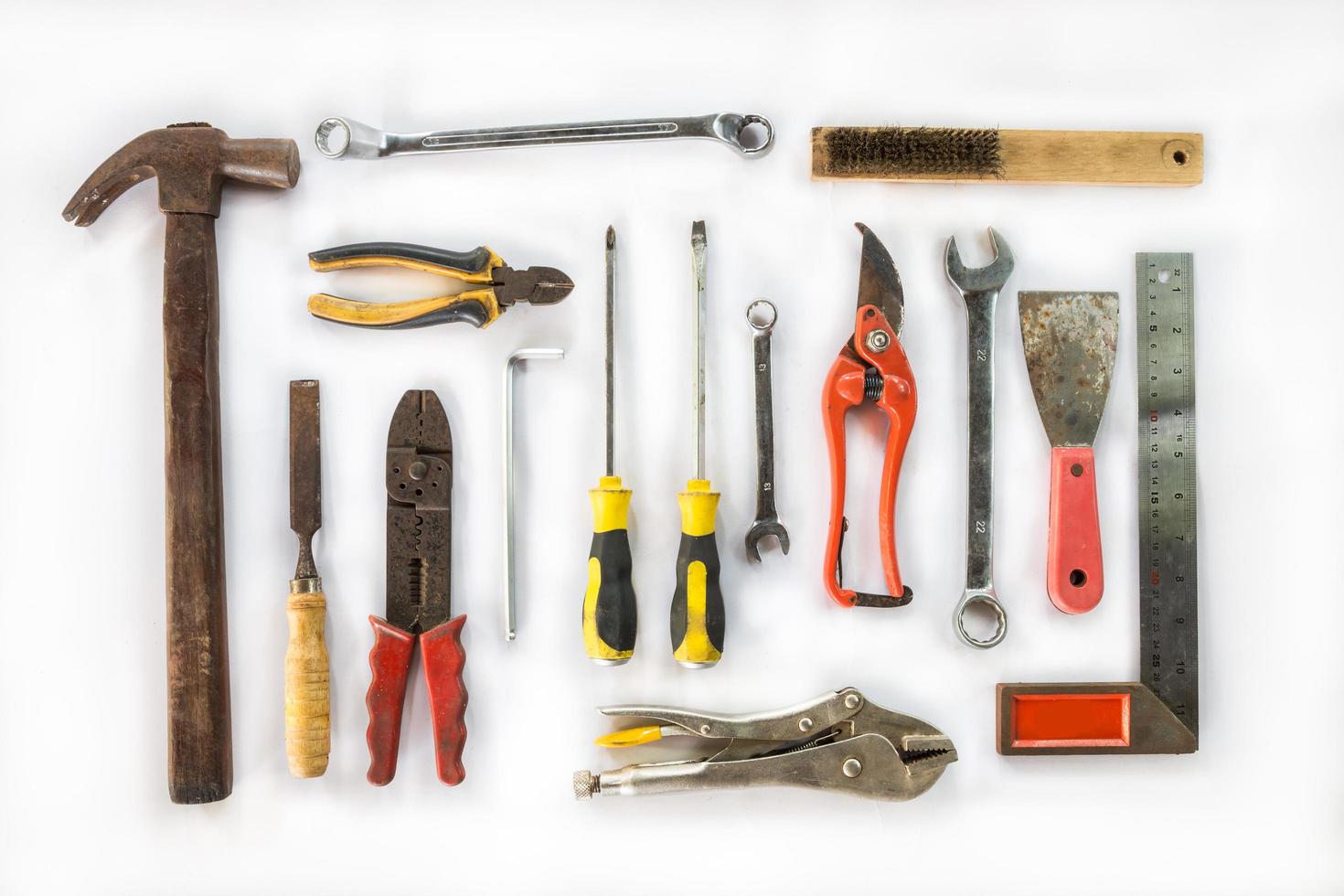 Various old craftsman tools on white background photo