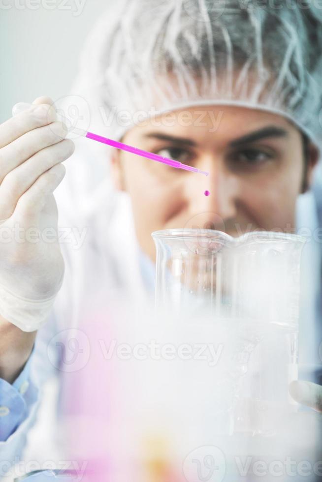 research and  science people  in laboratory photo