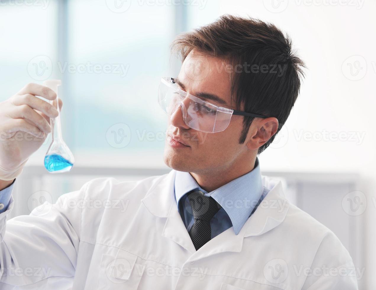 research and  science people  in laboratory photo