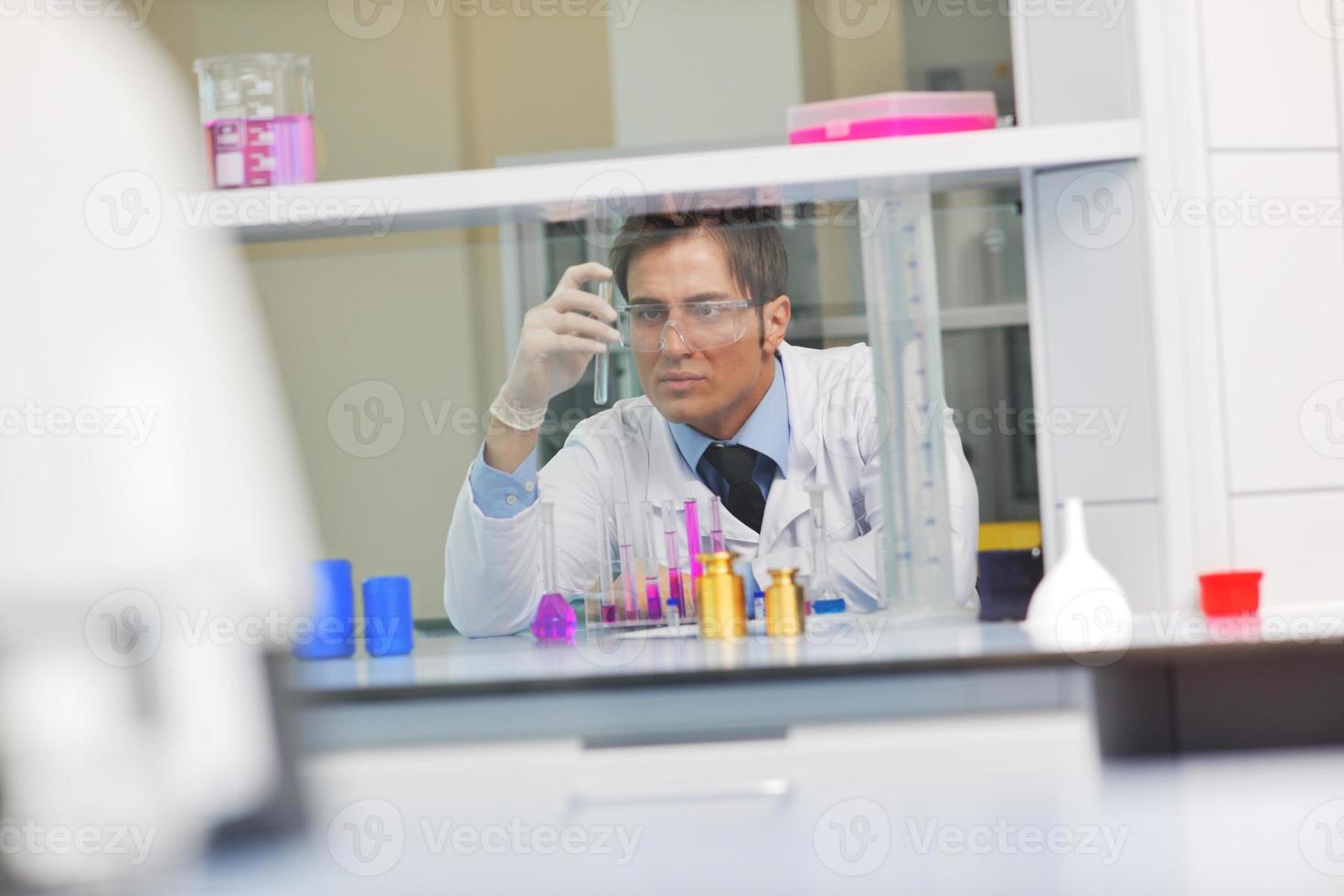 research and  science people  in laboratory photo