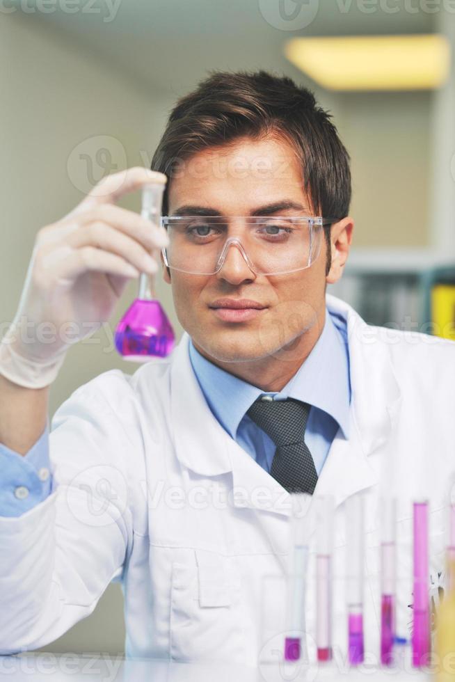 research and  science people  in laboratory photo